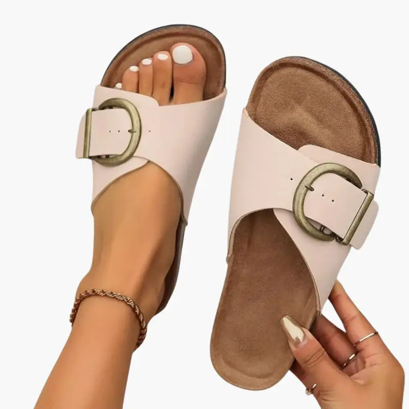 Pair of pale pink Wilfred Smith orthopedic sandals with adjustable buckled straps and cushioned soles.