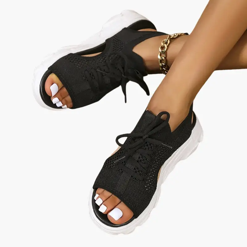 Women’s orthopedic sandals, black knit upper with adjustable laces, cushioned footbed, white chunky sole