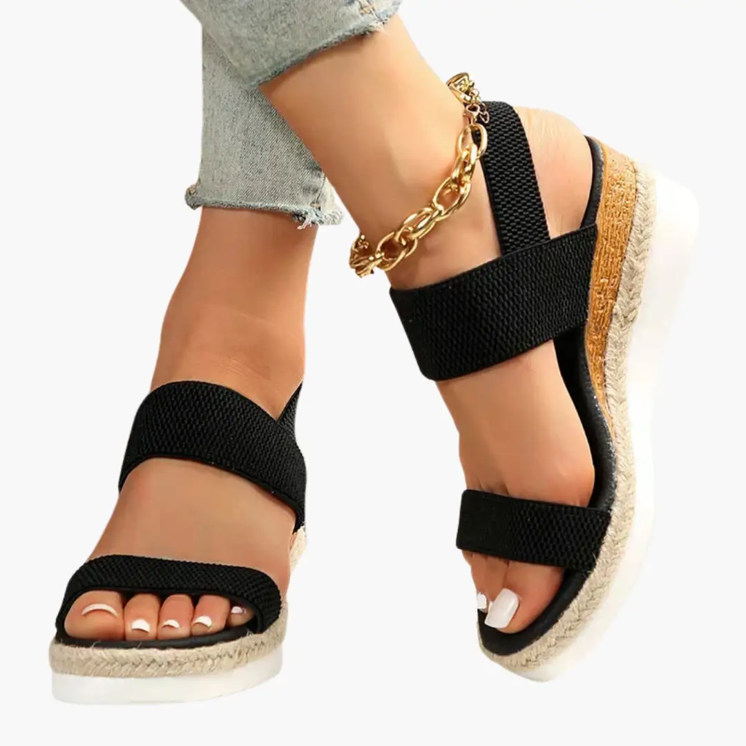 Women's orthopedic sandals with cushioned sole and adjustable straps, black fabric bands and rope-wrapped sole