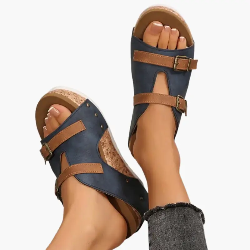 Wilfred Smith women's orthopedic sandals with navy blue straps, brown buckles and cork wedge sole