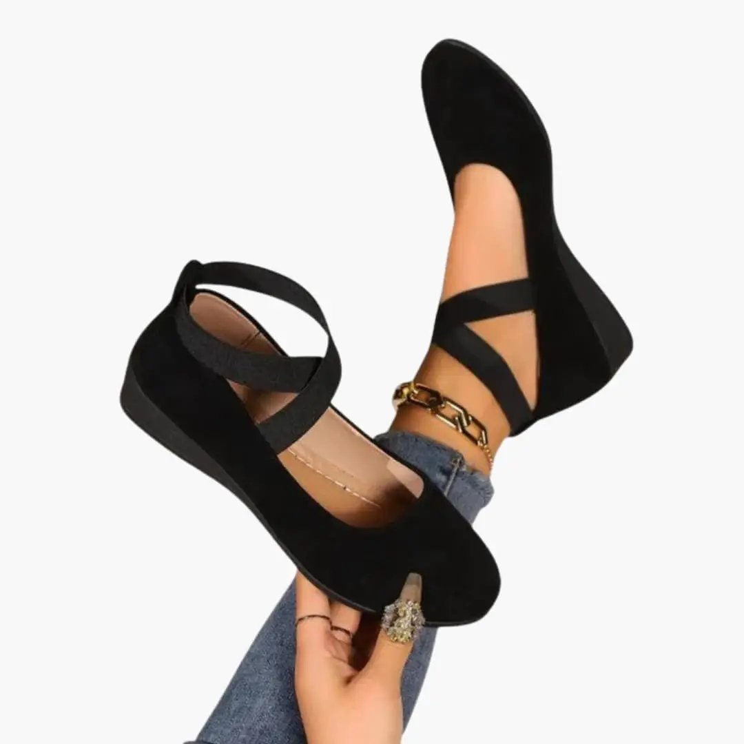 Women's orthopedic flats by Wilfred Smith; black suede slip-ons with ankle straps and cushioned sole
