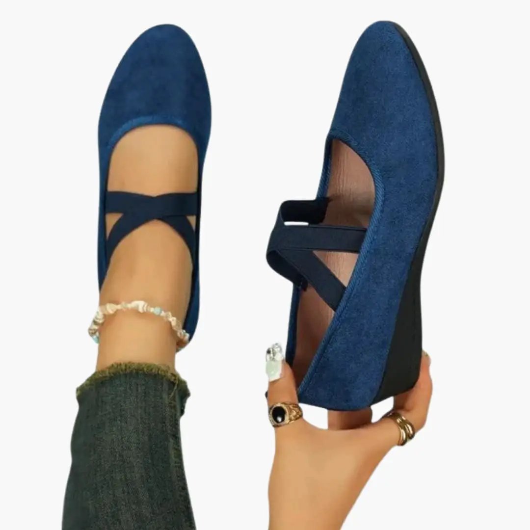 Women's orthopedic flats by Wilfred Smith, blue suede with cross-strap and cushioned sole