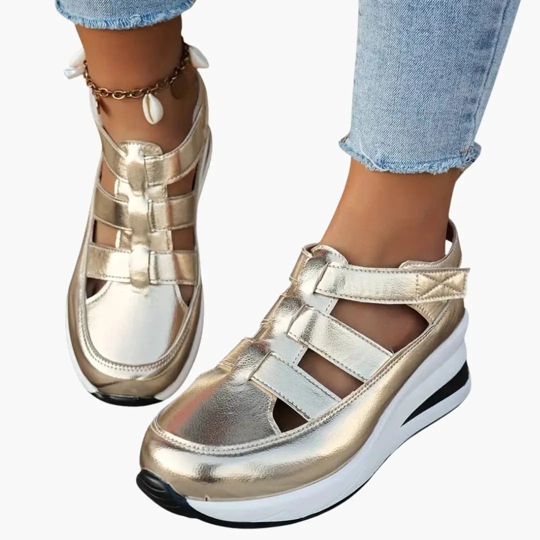 Women's orthopedic sandals in metallic gold with adjustable straps and textured sole