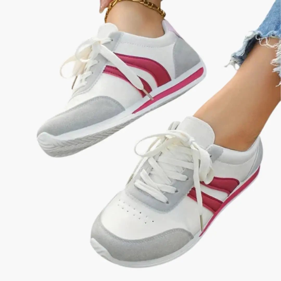 Women's orthopedic athletic shoes by Wilfred Smith, white with pink stripes, breathable upper