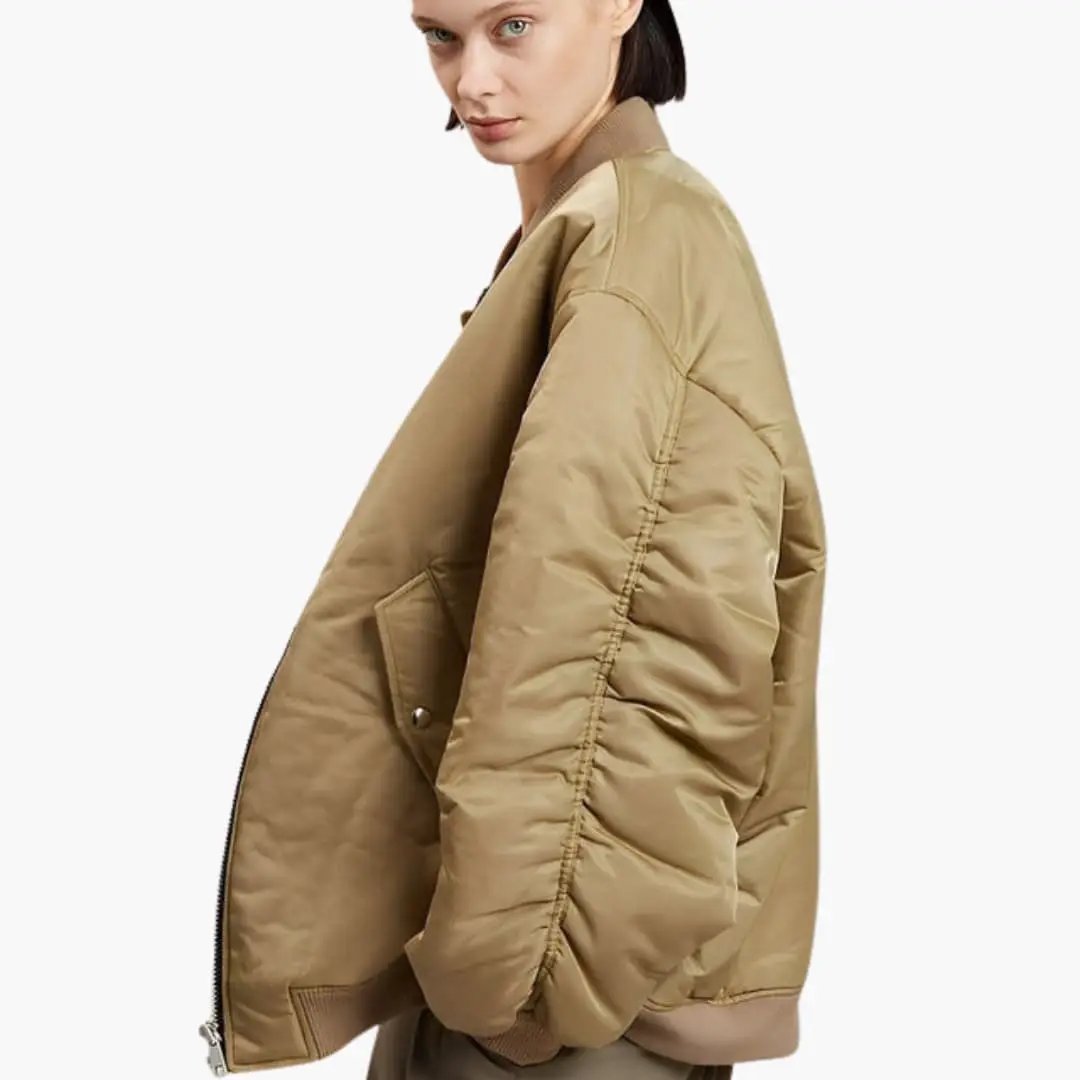 Women's oversized bomber jacket in tan with side pockets by Wilfred Smith