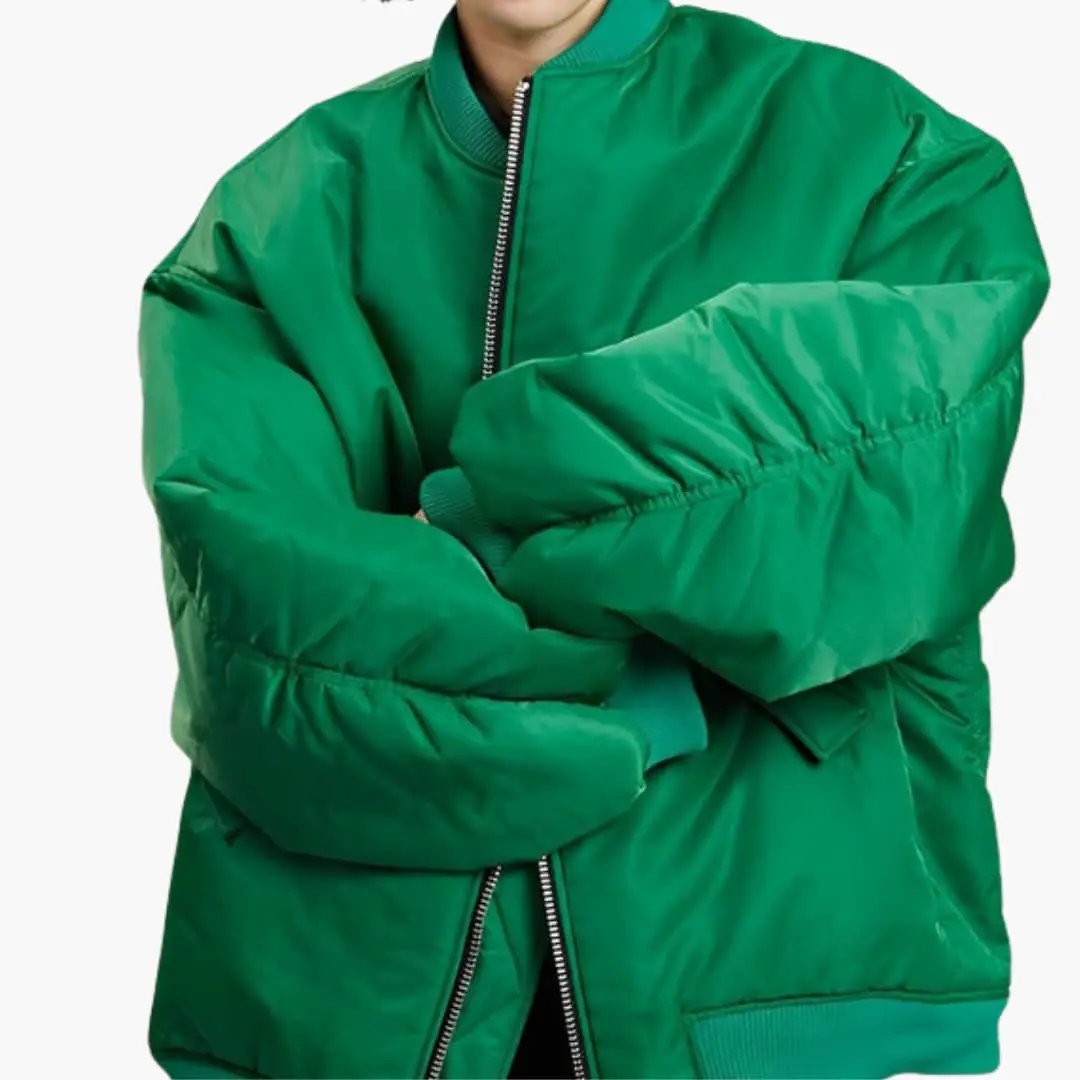 Women's oversized bomber jacket by Wilfred Smith, green with zip front and side pockets.