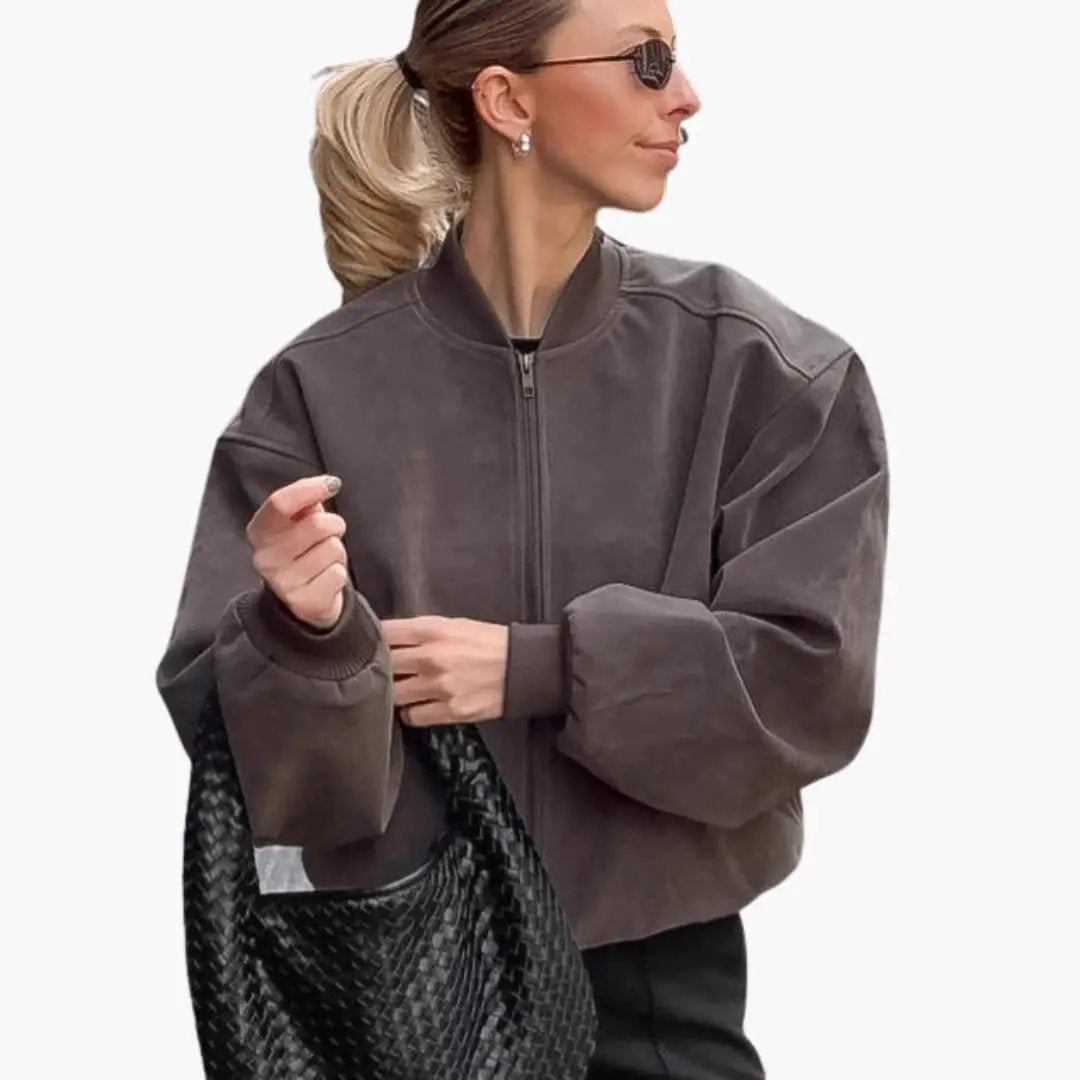 Women’s oversized bomber jacket by Wilfred Smith in taupe with stand collar and voluminous sleeves