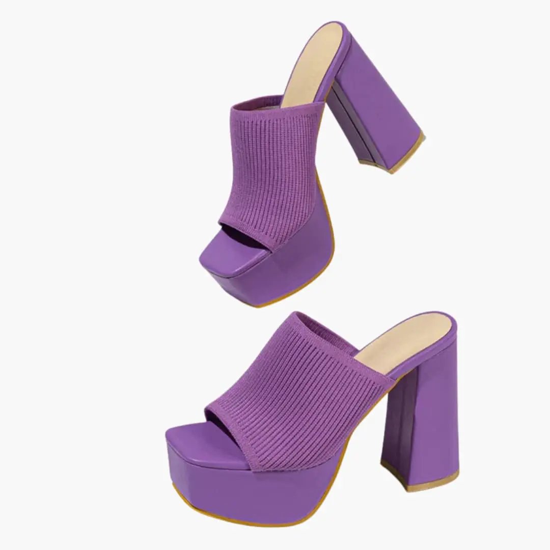 Pair of purple women's platform sandals with knit upper, cushioned insole, open-toe, and chunky heel.