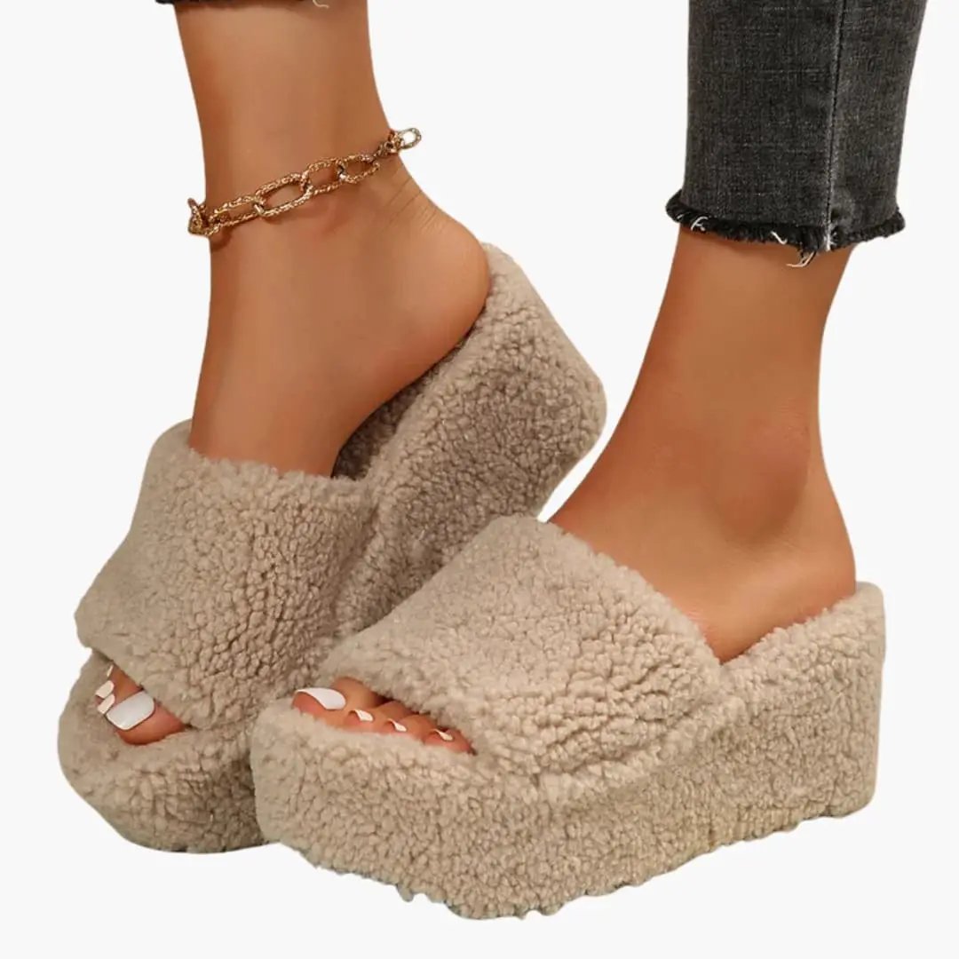 Women's fuzzy beige platform wedge sandals with contoured insole and textured sole