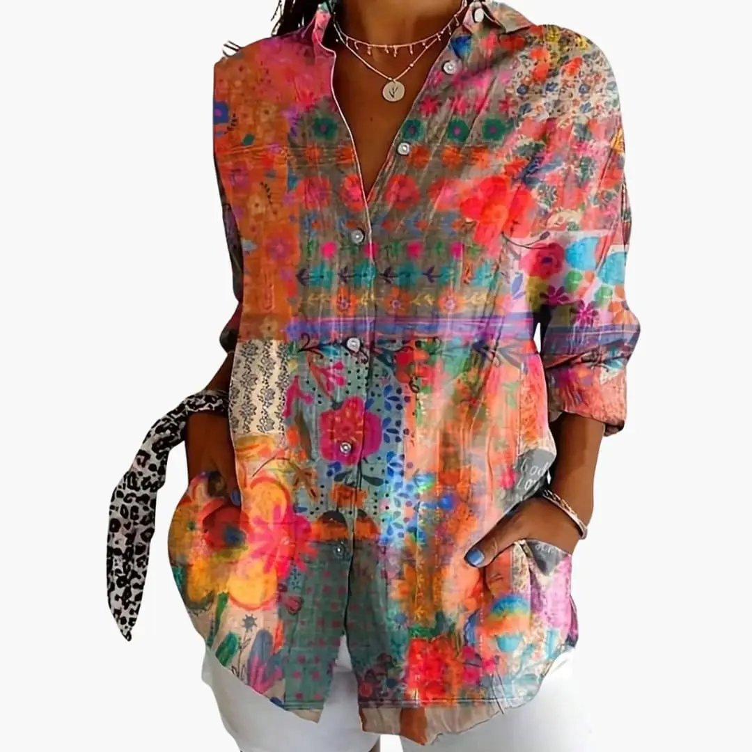 Women's printed blouse by Wilfred Smith, multicolor floral print, button front, loose-fit with rolled sleeves.