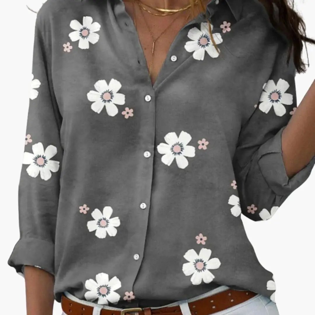 Women's printed button-down blouse in gray with white floral pattern, collared long sleeves, loose fit.