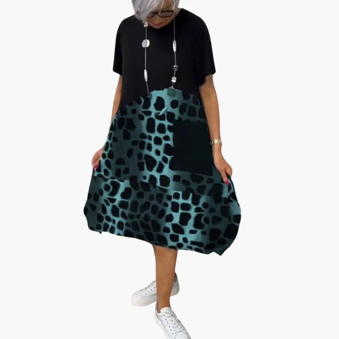 Women’s Printed Summer Dress with Short Sleeves by Wilfred Smith, black top with teal leopard-print skirt