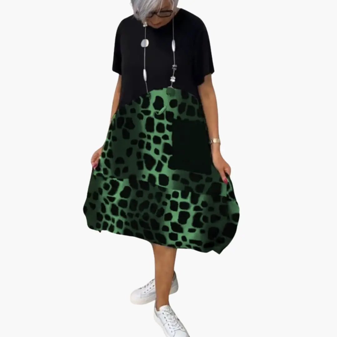 Women’s Printed Summer Dress with Short Sleeves, black top with green abstract animal-print skirt panel