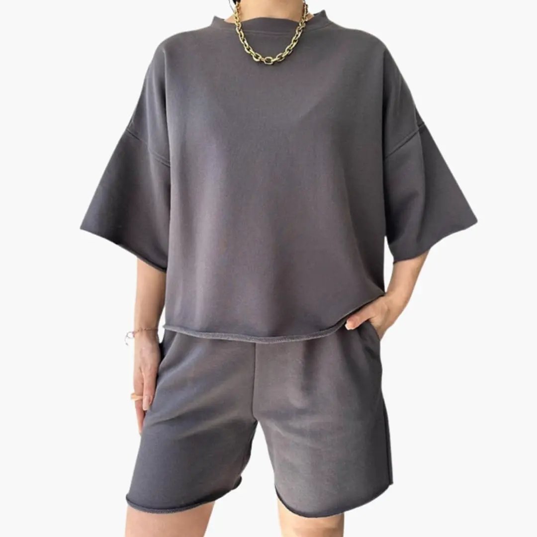 Women's two-piece set: charcoal gray round-neck crop top with drawstring waist shorts by Wilfred Smith.