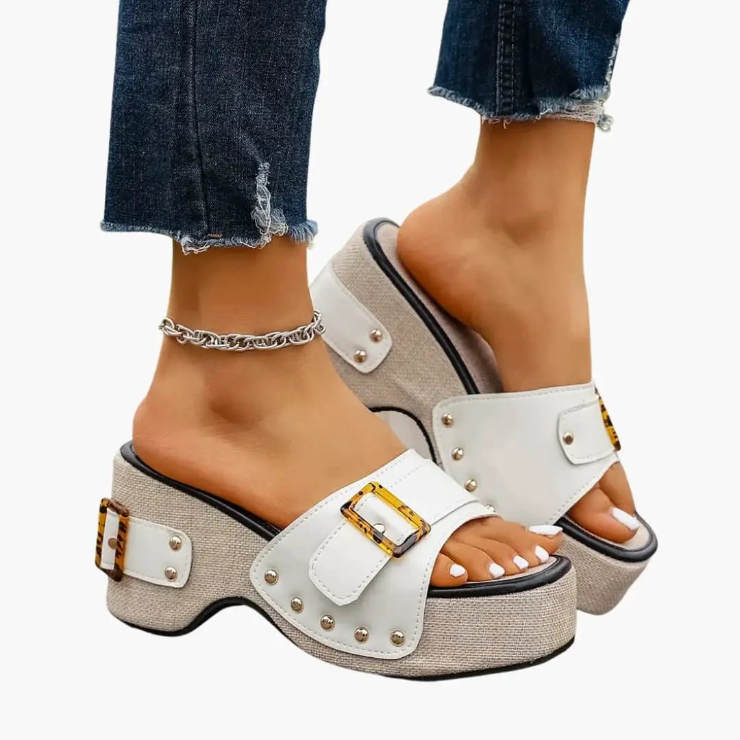 Women's platform sandals with white straps, cushioned insole, and beige woven sole