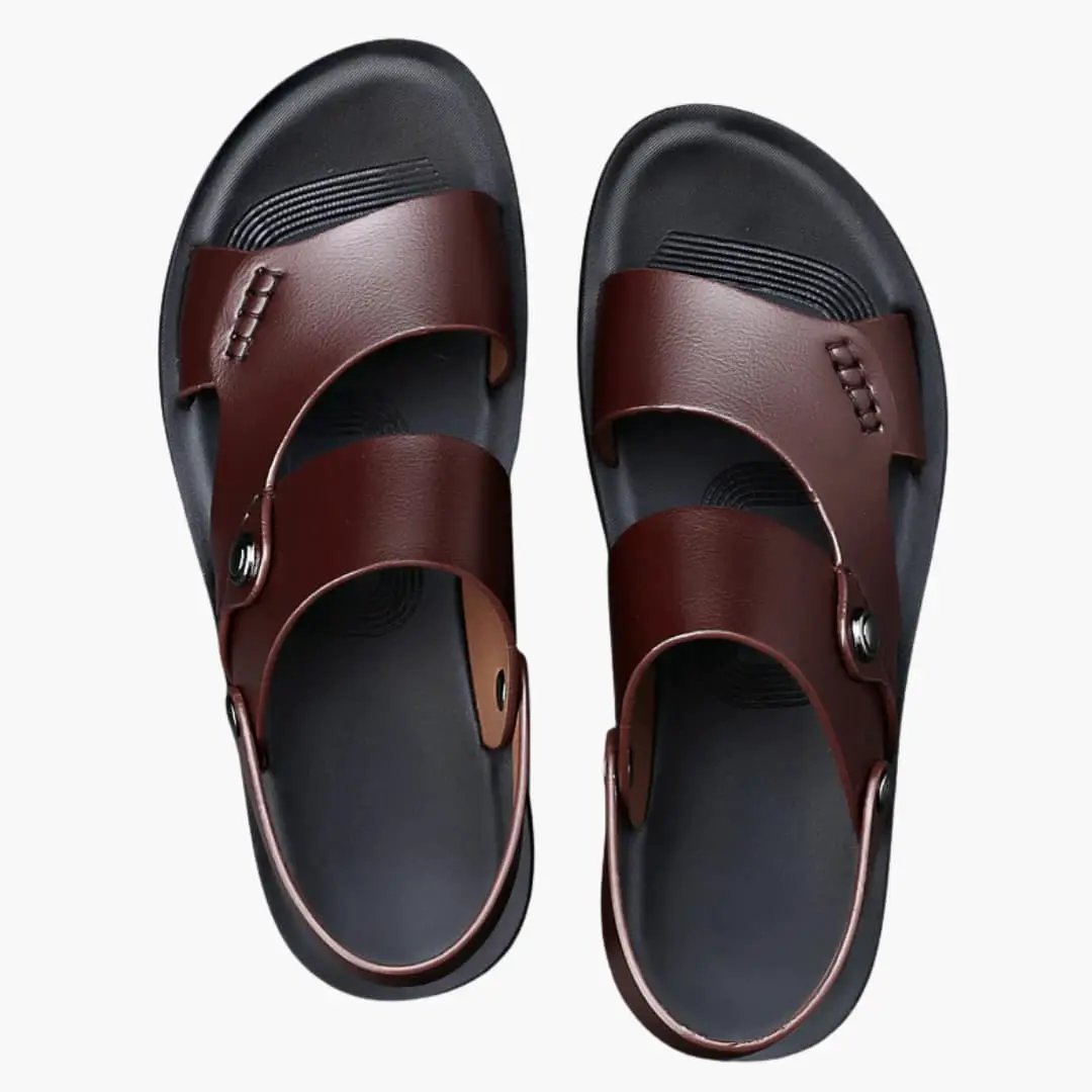 Pair of women's sandals with brown vegan leather straps and cushioned insole by Wilfred Smith