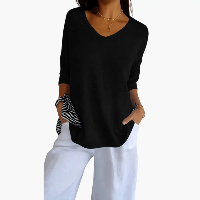 Women’s V-Neck Pullover Top by Wilfred Smith in black knit with 3/4 sleeves.