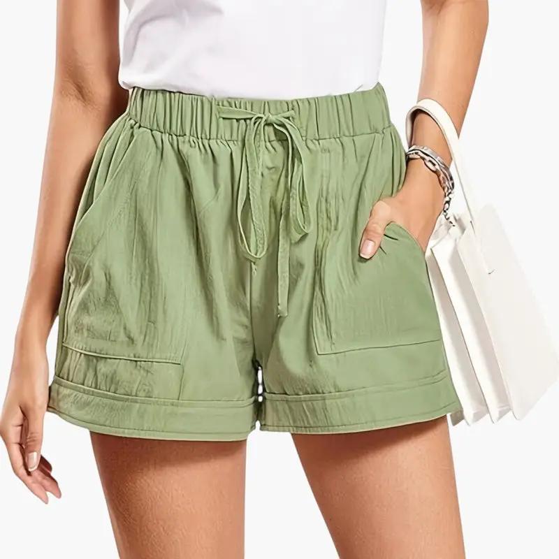 Women's olive green jogger shorts with drawstring waistband, pockets, and relaxed fit