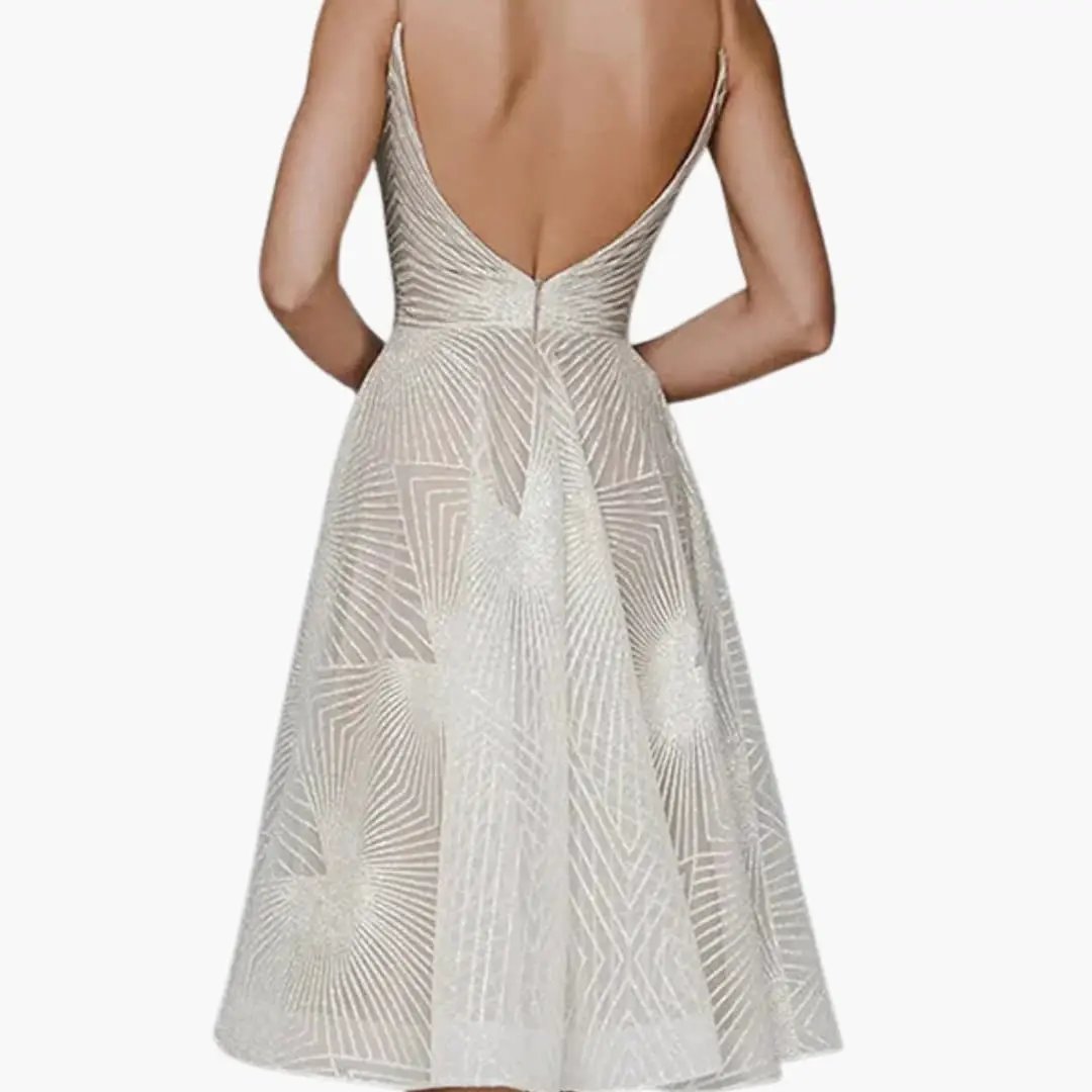 Women’s sleeveless midi dress with open back in silver metallic geometric pattern by Wilfred Smith