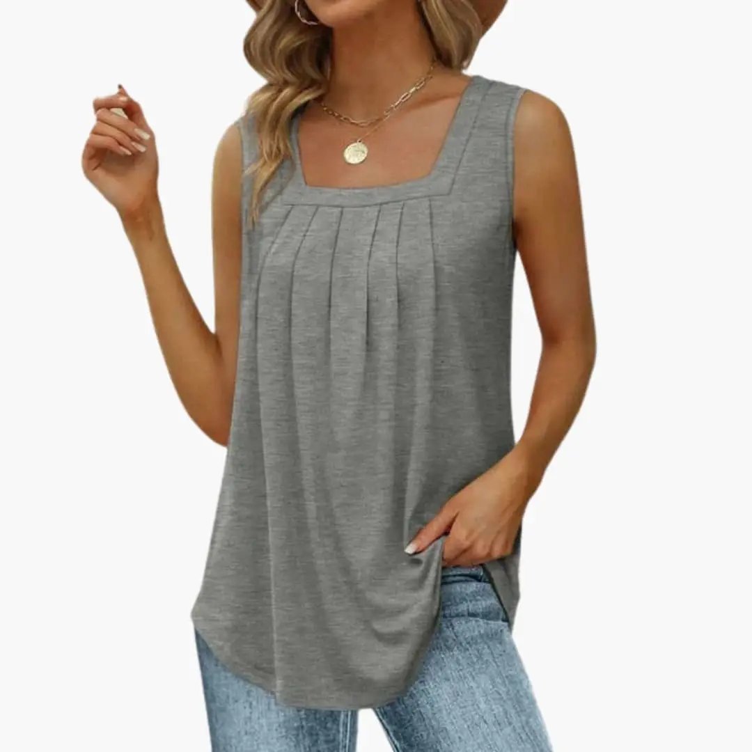 Women's tank top in grey plain-woven fabric with a pleated front yoke, hip-length.