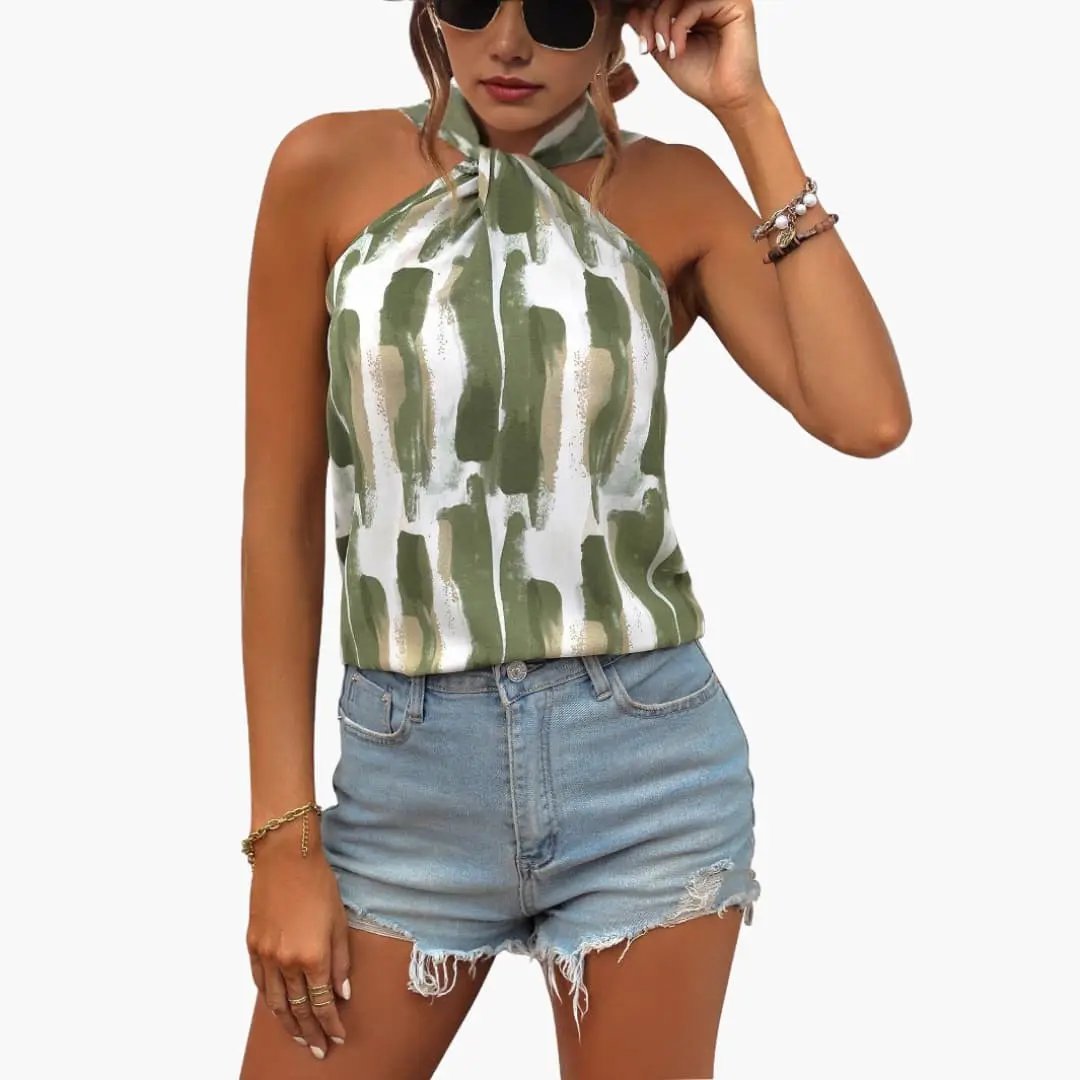 Women's sleeveless halter top with knot closure in green and white abstract print, lightweight fabric