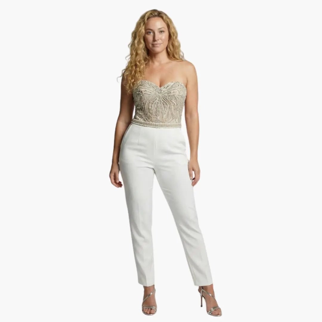 Women’s strapless jumpsuit with a beaded bodice and white straight-leg pants.
