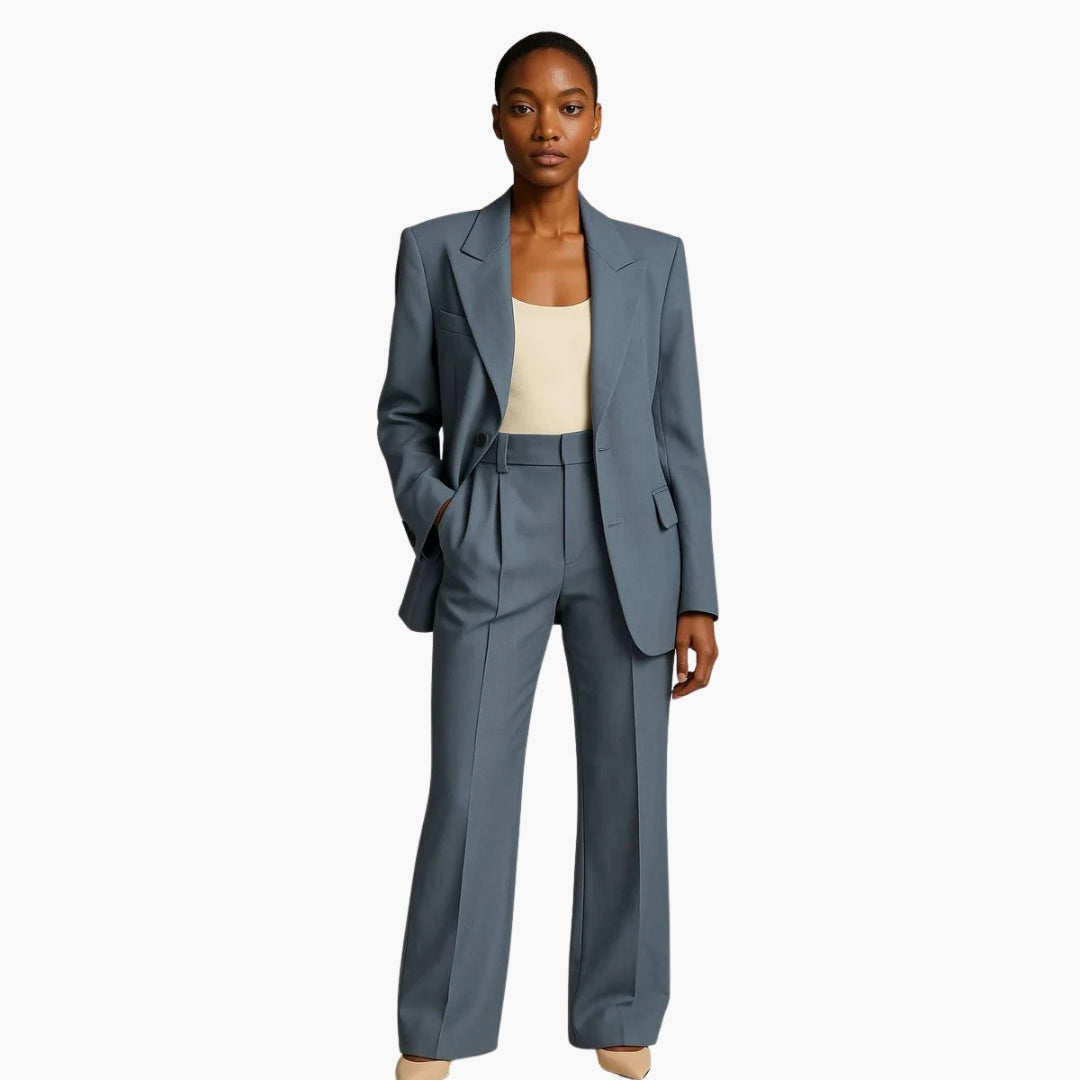 Women's wedding suit set with blue-gray blazer and matching wide-leg trousers by Wilfred Smith.