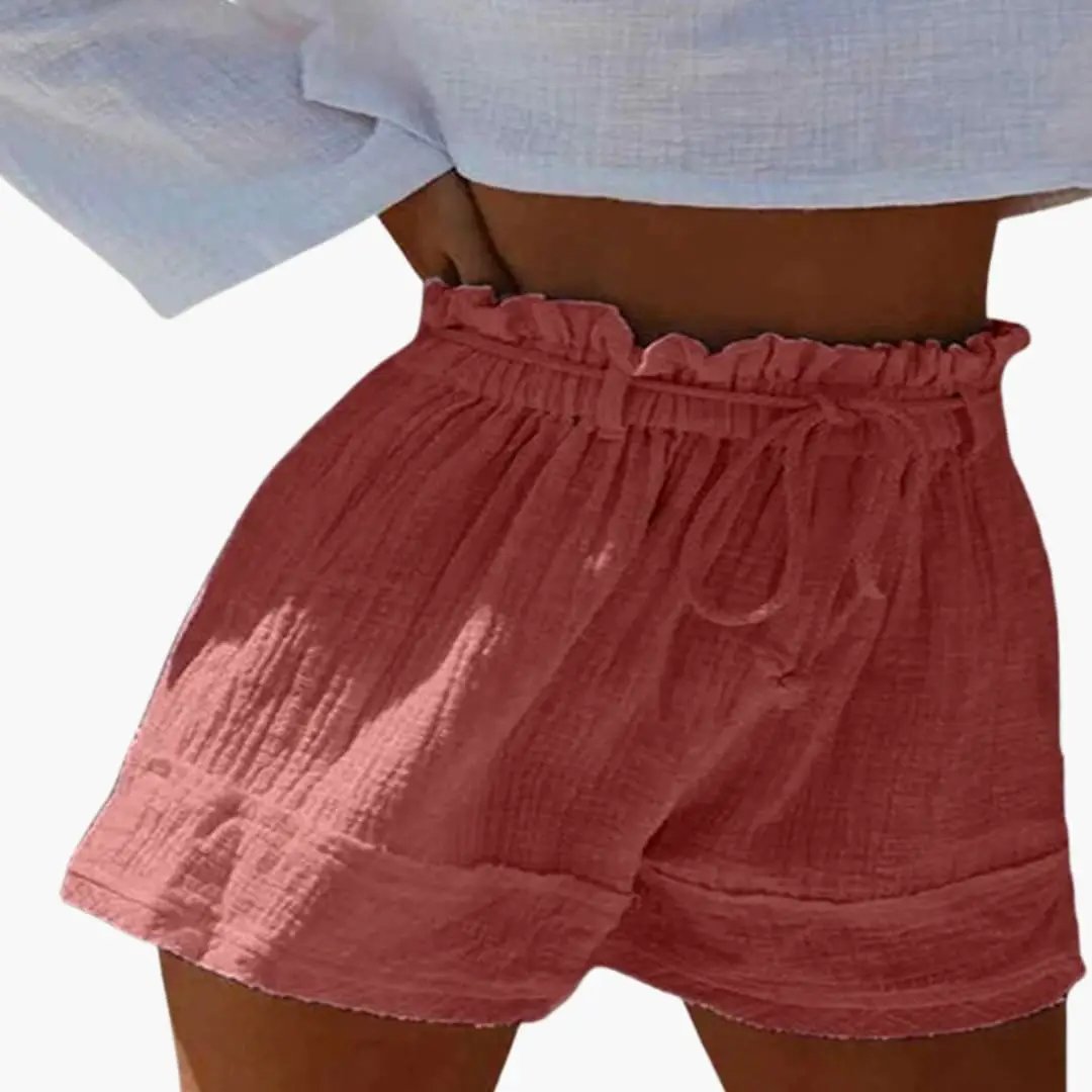 Women's coral pink shorts with elastic waist and drawstring