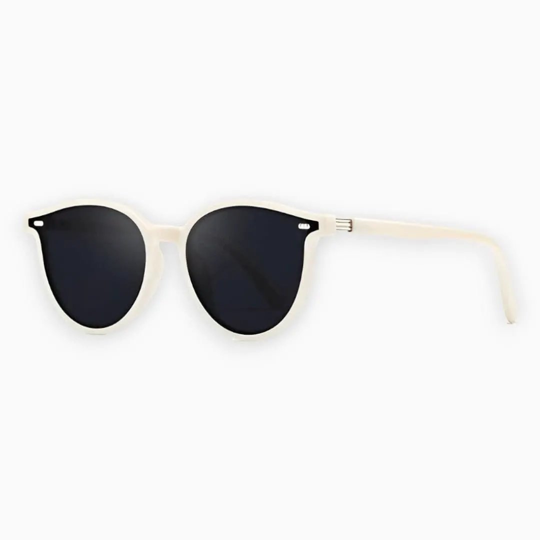 Women's sunglasses by Wilfred Smith with cream lightweight full-rim frame and dark UV lenses