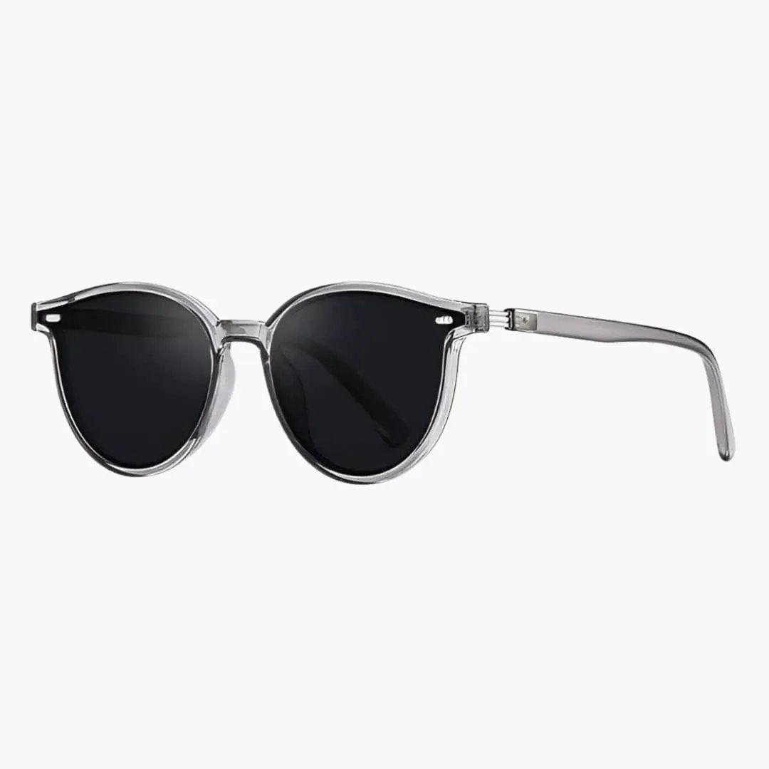 Women's sunglasses with clear full-rim frame and black UV lenses by Wilfred Smith