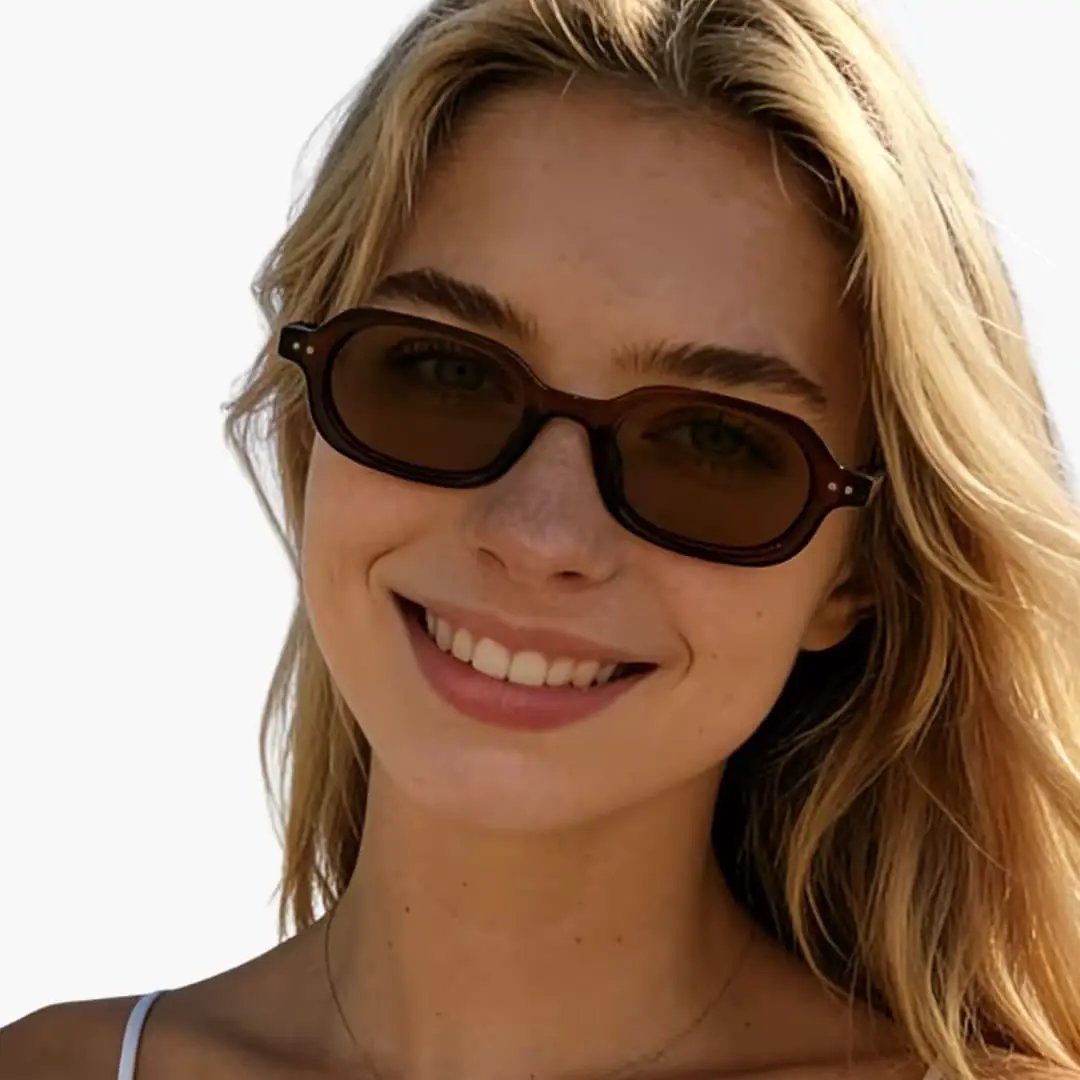 Women's sunglasses with brown oval cat-eye frame and UV400 lenses by Wilfred Smith