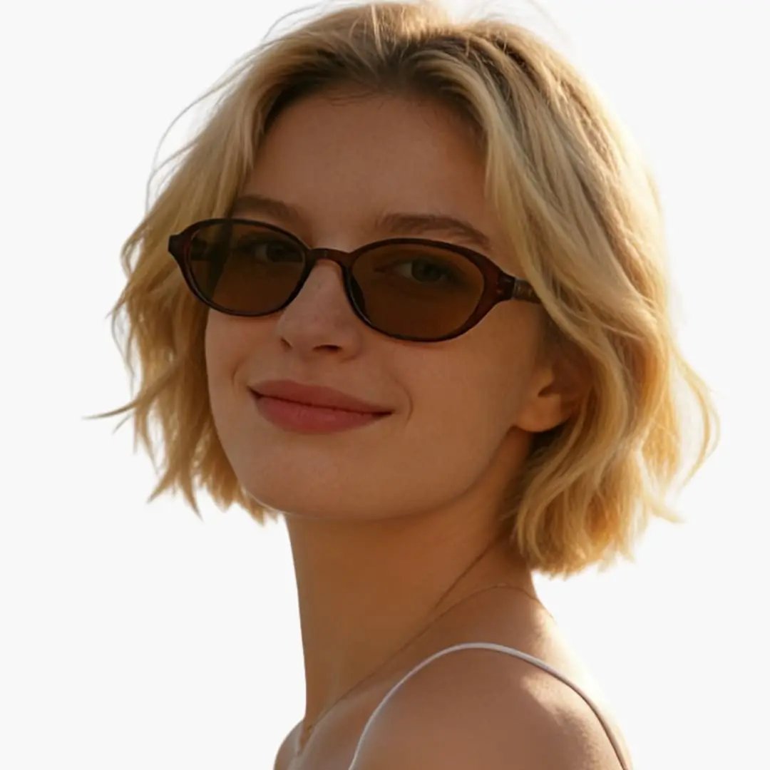 Women's sunglasses with an oval tortoiseshell frame and UV400 lenses