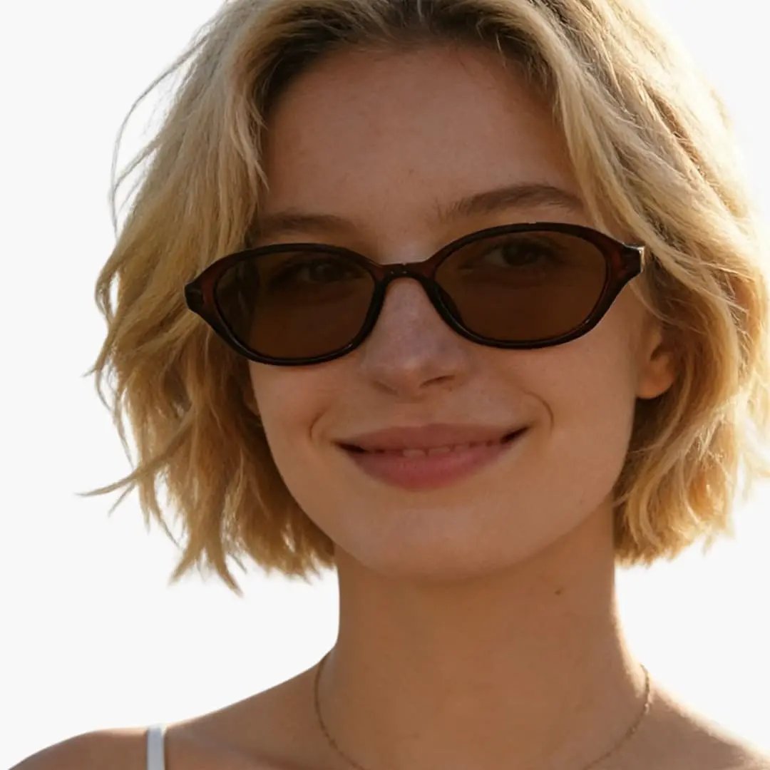 Women's sunglasses by Wilfred Smith with oval tortoiseshell frame and UV400 lenses