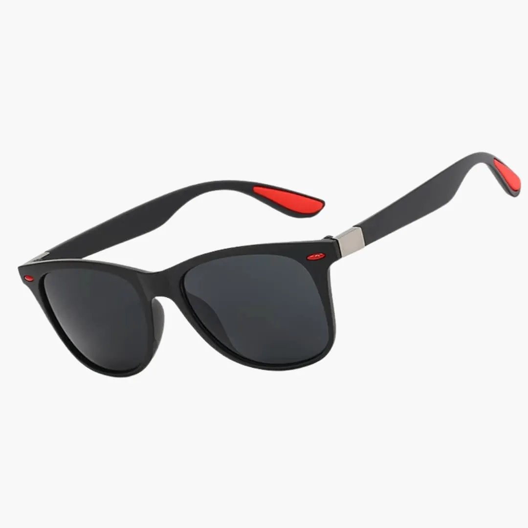 Women's sunglasses by Wilfred Smith with square black frame and mirrored lenses, red temple tips.