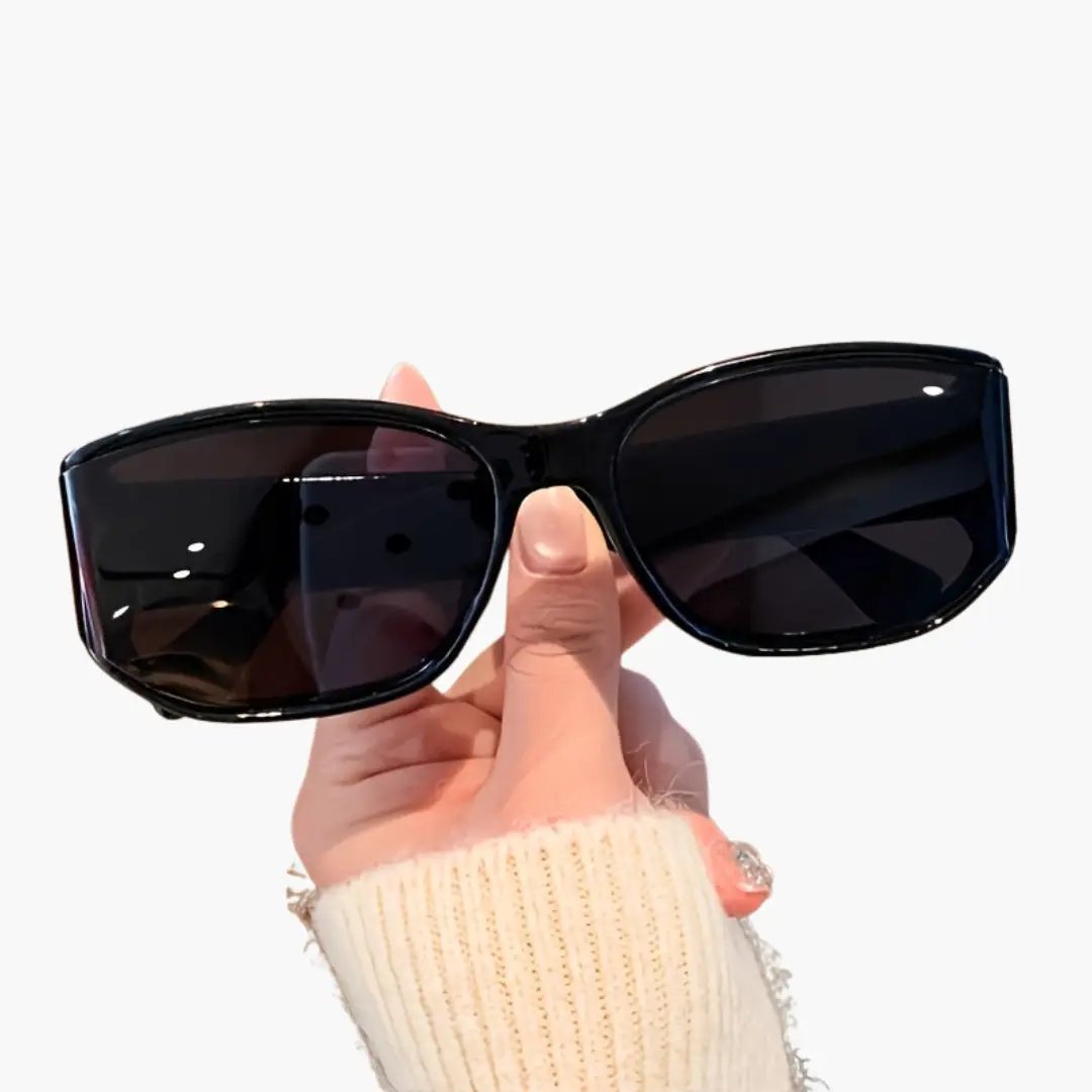 Women's wrap-frame sunglasses with black frame and UV400 dark lenses.