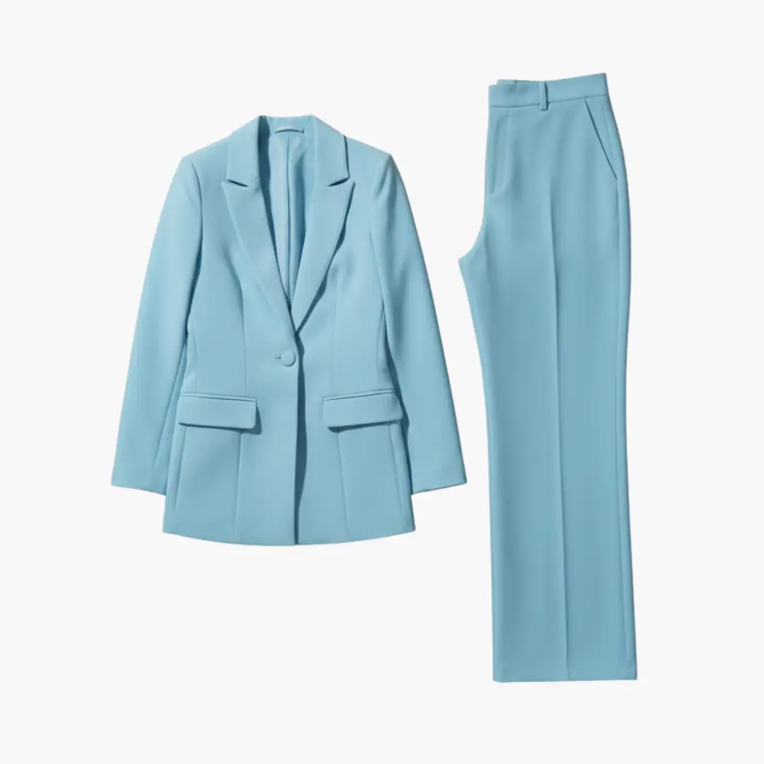 Women's wedding two-piece blazer and pants suit by Wilfred Smith in light blue.