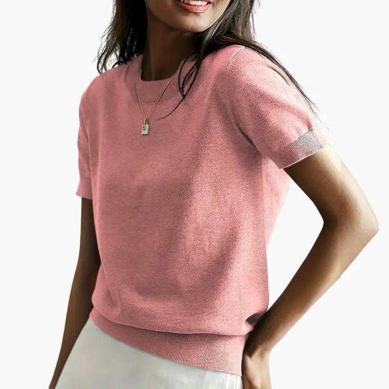Women's pink short-sleeve top with lightweight knit and ribbed hem and cuffs.