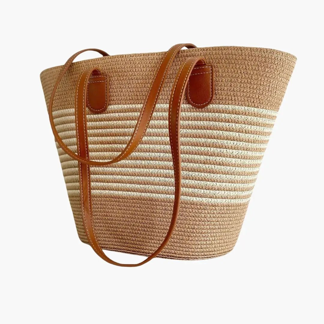 Women's tote bag with zip closure and shoulder straps, natural straw weave with tan leather handles