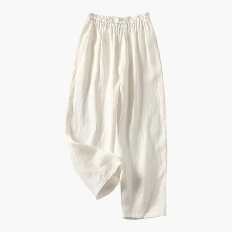 Women's white linen-like trousers with elastic waistband and side pockets