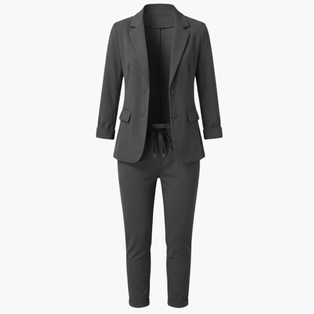 Women's two-piece blazer set in charcoal gray with notched-lapel blazer and ankle-length pants by Wilfred Smith