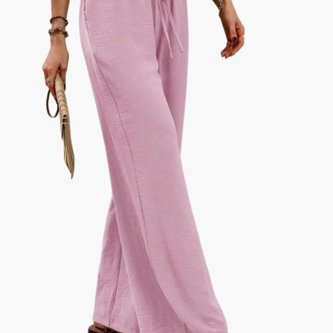 Women's wide-leg pants in pink with elastic waistband and side pockets by Wilfred Smith