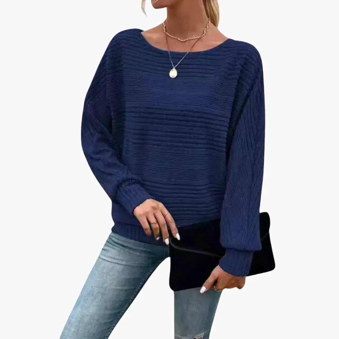 Women's navy striped knit sweater with boat neck and ribbed texture