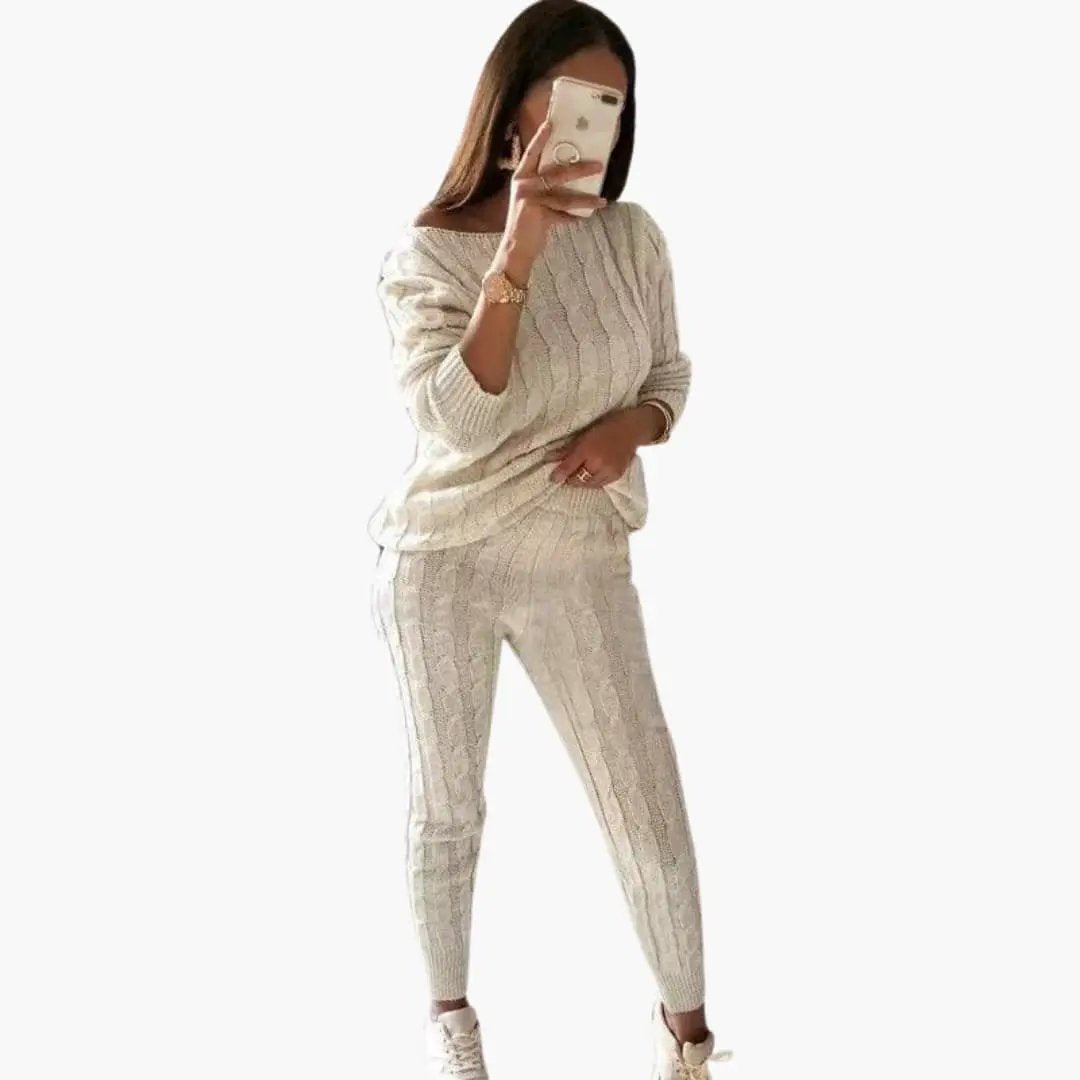 Women's knit two-piece set in cream with long sleeves and elastic waistband.