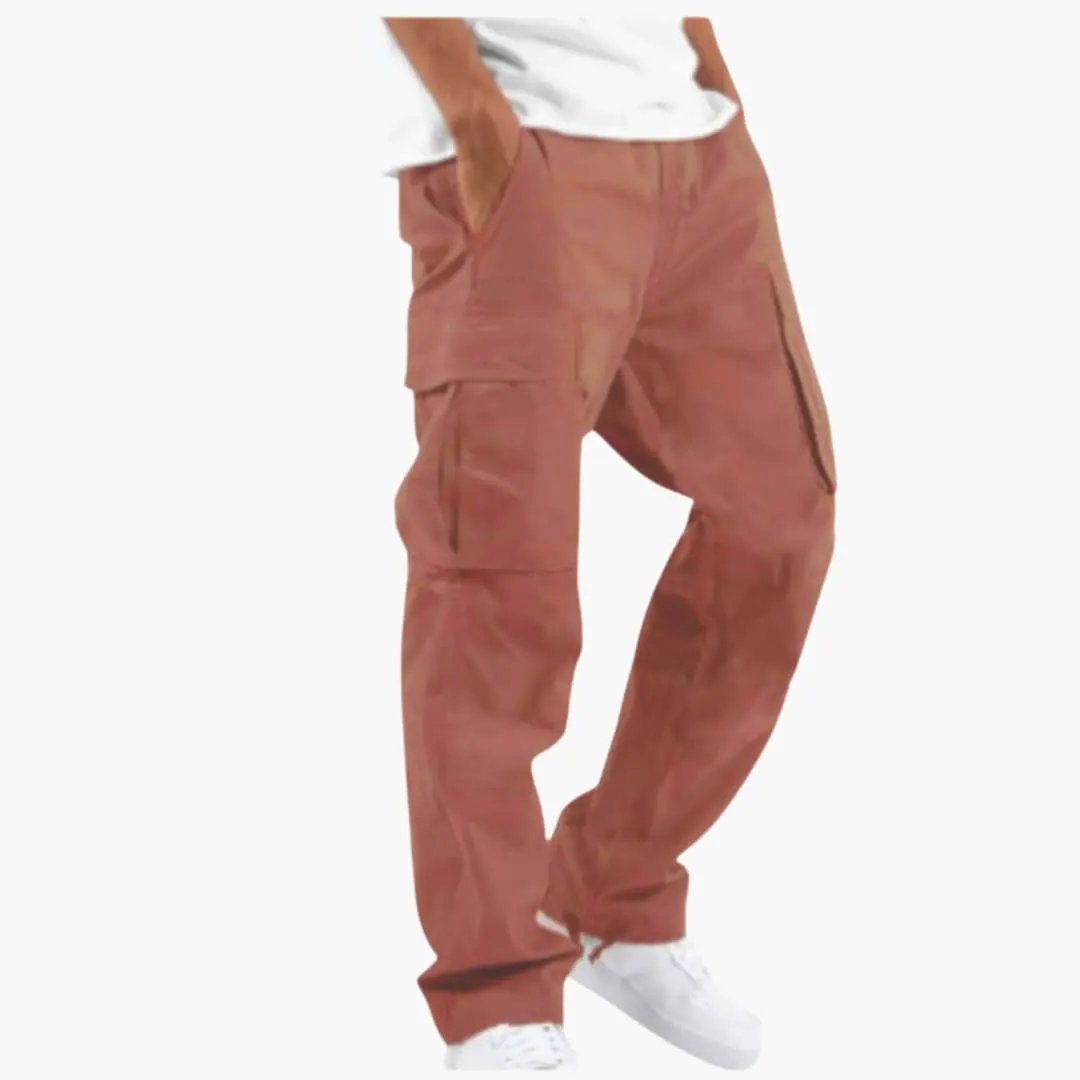 Wilfred Smith Men’s cargo pants with wide legs and multiple pockets, rust-brown color.