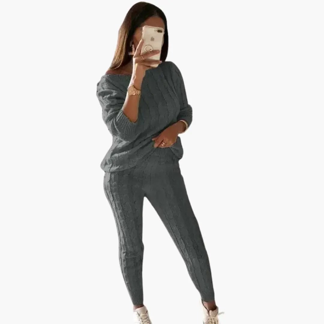 Two-piece knitted set by Wilfred Smith in gray; long-sleeve top and pants with elastic waistband