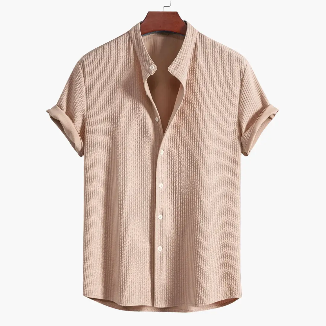 Men's stand-collar shirt by Wilfred Smith in ribbed pink-beige fabric with rolled short sleeves.