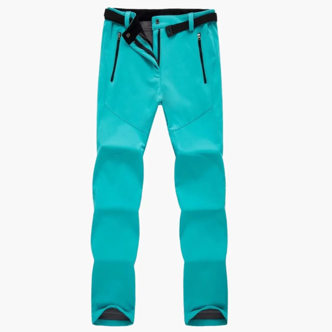 Women's hiking pants with zip pockets in teal by Wilfred Smith