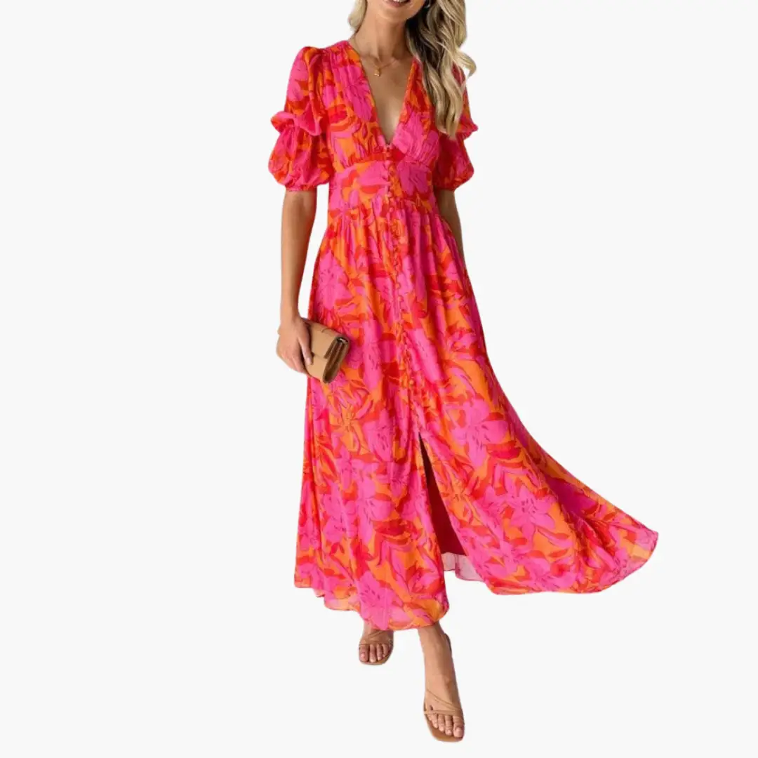 Elegant floral maxi dress with a V-neck and puff sleeves in pink and orange.