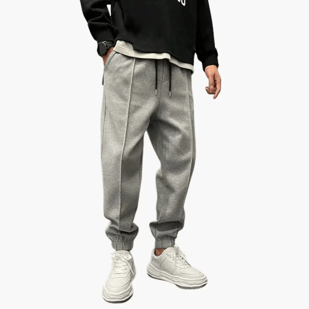 Men’s Cargo Trousers in grey with relaxed fit, drawstring waist and elastic cuffs.
