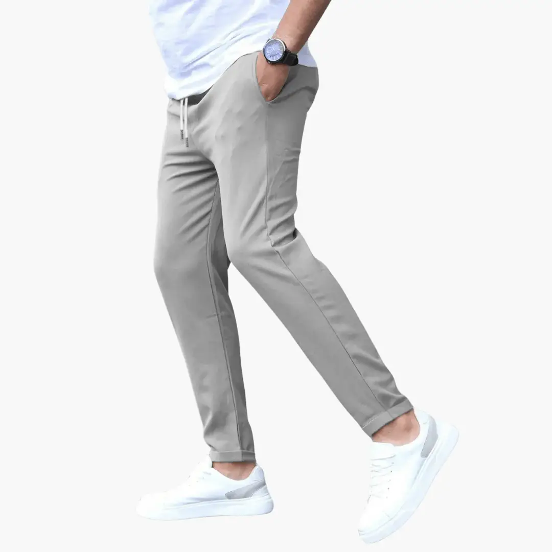 Wilfred Smith men's stretch trousers with slim legs and drawstring waistband, light gray.